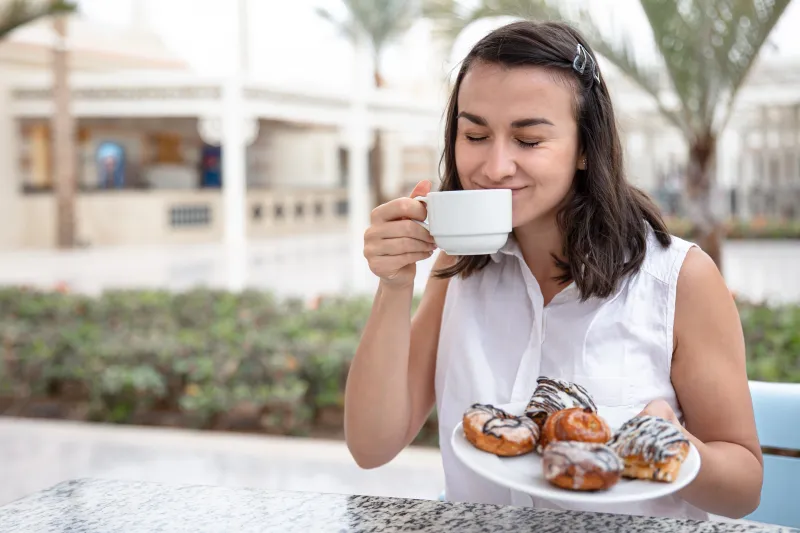 How Do Diet and Caffeine Consumption Affect Sleep on Holiday?